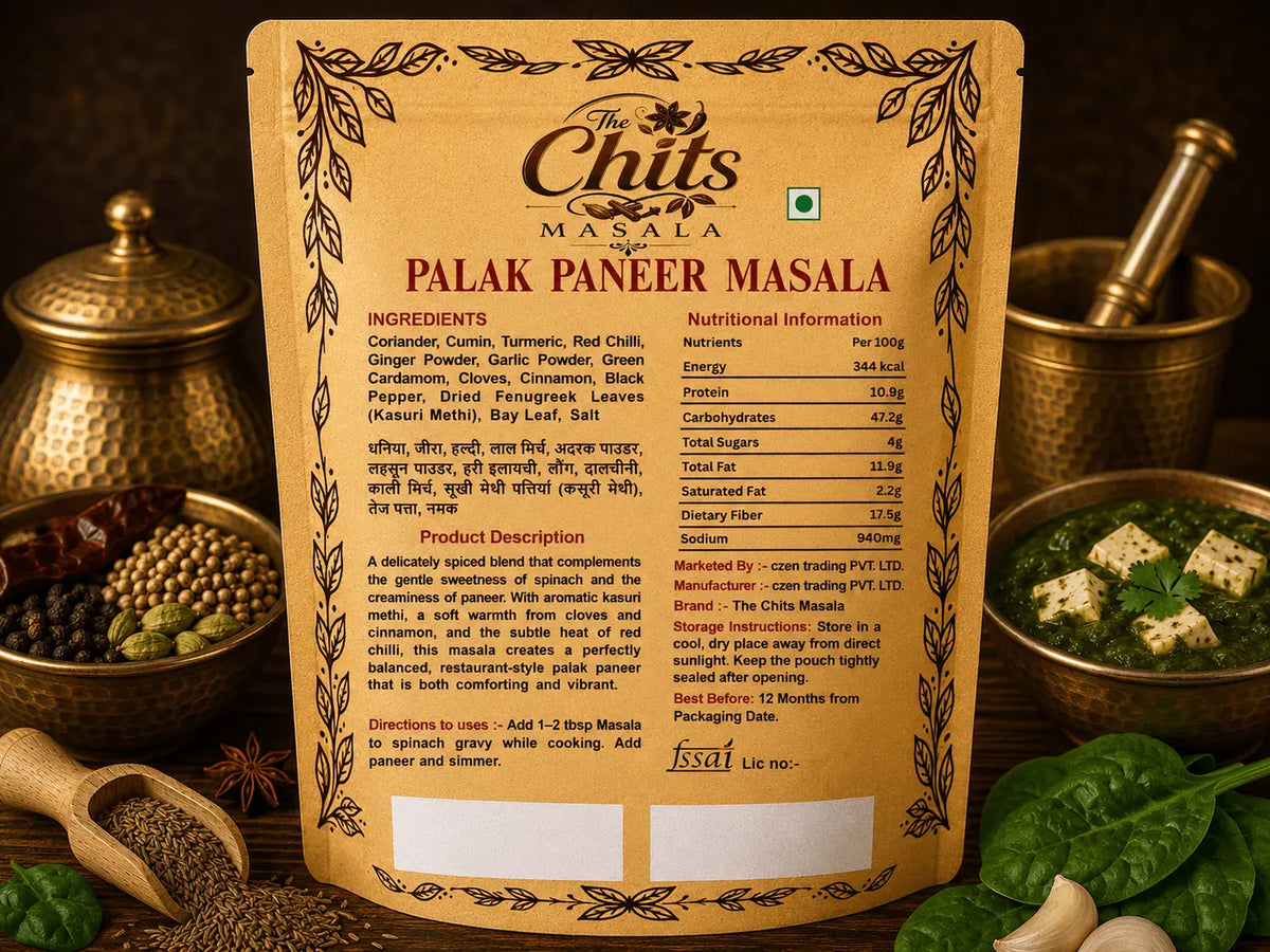 A package of Chuti Masala Palak Paneer Masala standing upright, surrounded by cooking ingredients like onions, garlic, ginger, and spices on a dark wooden surface.