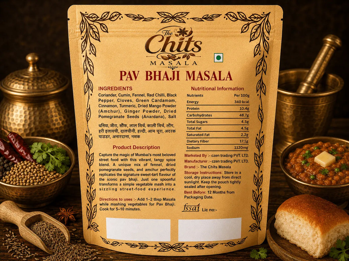 Back packaging of Pav Bhaji Masala by The Chits, displayed against a warm, dark background with traditional Indian cooking elements like a brass lamp, spices, and a piece of bread.