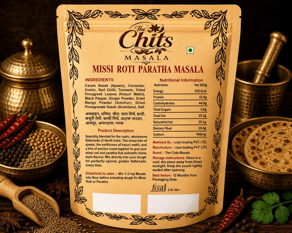 Back of a package of The Chuts Masala Missi Roti Paratha Masala shown in a styled kitchen setting with spices and utensils.