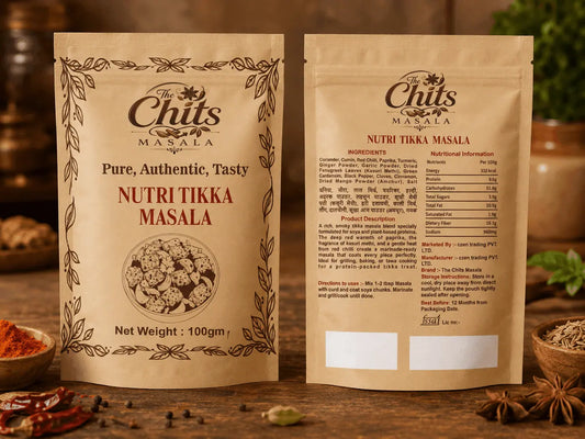 Two stand-up pouches of Chits Masala Nutri Tikka Masala shown side by side on a wooden surface, with spices and food props around them. The front pouch shows the product name and branding, while the back pouch displays ingredients and nutrition information.