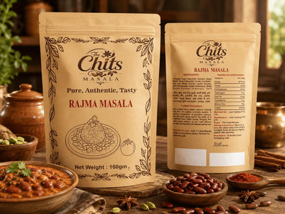 Two stand-up pouches of Chits Masala Rajma Masala seasoning displayed on a rustic wooden table with bowls of spices and food props in the background.